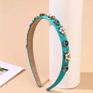 Bran new headband in packaging.